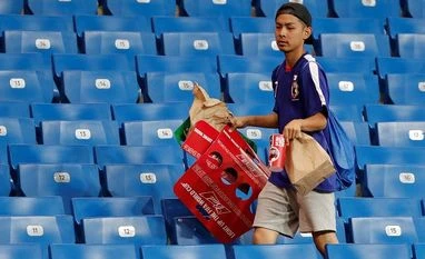 Japanese fans clean stadium even after heart-breaking loss to Belgium Japan supporters