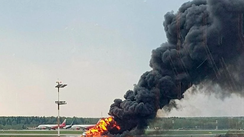 smoke rises from fire on a plane at Moscow's Sheremetyevo airport smoke rises from fire on a plane at Moscow's Sheremetyevo airport