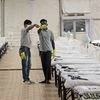 Workers while preparing the makeshift quarantine center for COVID-19 patients, in Mumbai on Saturday.