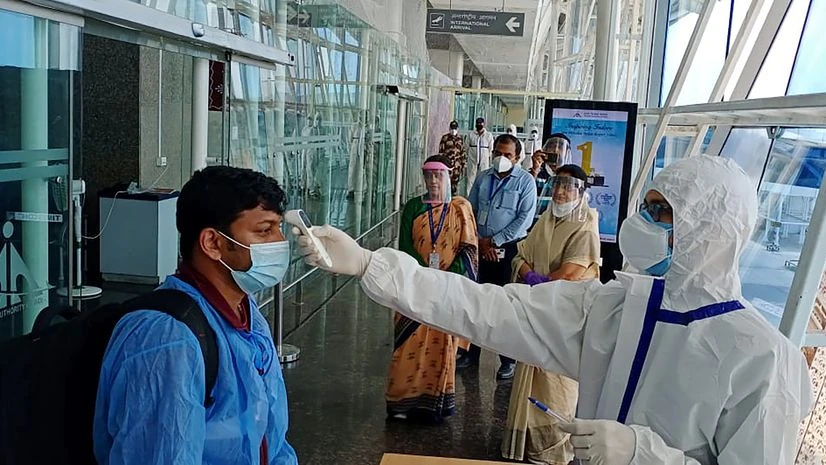 Air passengers being screened after arriving at Indore Airport Air passengers being screened after arriving at Indore Airport