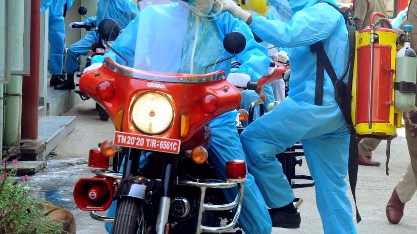 Firefighters wearing PPE kits ride bikes as around 60 of them who were on duty during Covid-19 pandemic return to station after successfully recovering in Chennai Firefighters wearing PPE kits ride bikes as around 60 of them who were on duty during Covid-19 pandemic return to station after successfully recovering in Chennai