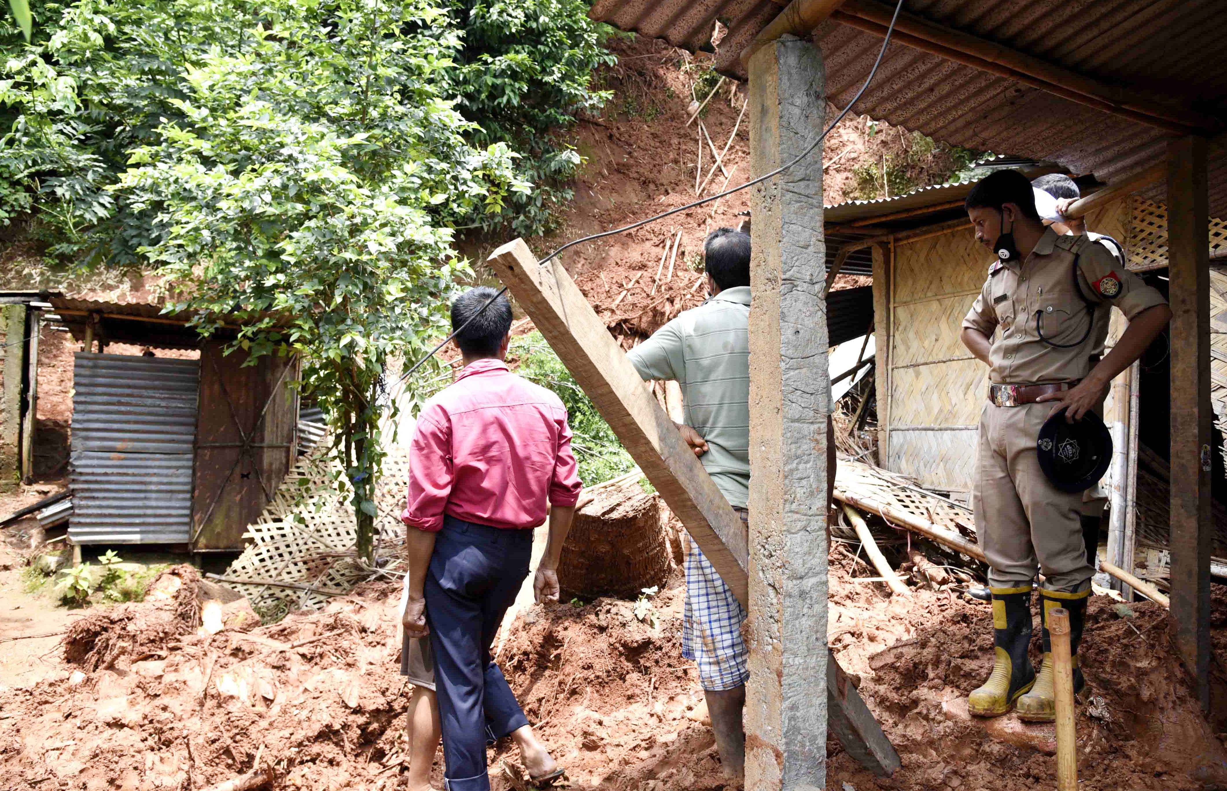 Debris piles after a landslide due to incessant rain at Kharguli area, in Guwahati on Sunday Debris piles after a landslide due to incessant rain at Kharguli area, in Guwahati on Sunday