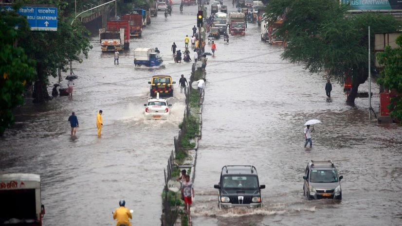Mumbai rain Vehicles ply through water logged LBS roads after heavy rainfall, in Mumbai on Sunday.