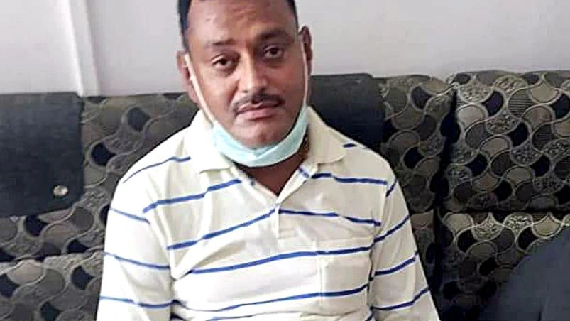 Vikas Dubey Gangster Vikas Dubey in police custody after he was arrested at Mahakaleshwar temple in Ujjain on Thursday. Photo: ANI