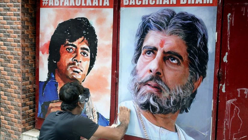 Amitabh Bachchan fans Amitabh Bachchan fan paste his poster at fan club gates as Amitabh Bachchan tested positive for COVID-19 and admitted in Hospital, in Kolkata on Sunday.