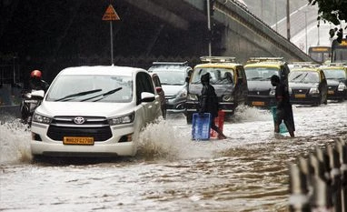 In pictures: Heavy showers in Mumbai, IMD says more rains likely Mumbai rain