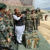 Defence Minister Rajnath Singh inspects a Pika machine gun at Stakna, Leh on Friday.