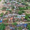 An aerial view of flooded Bind Toli area along the banks of River Ganga following heavy monsoon rainfall, in Patna on Monday.
