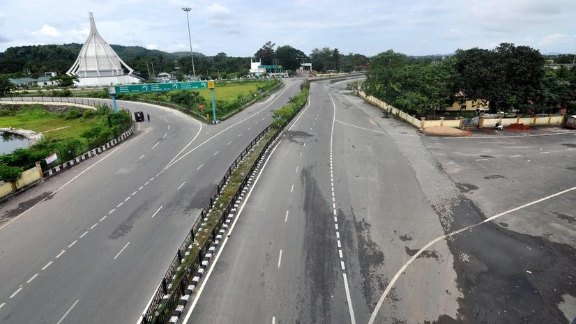 lockdown A city road wears a deserted look during the weekly two-day complete lockdown to curb the spread of coronavirus disease, in Guwahati on Saturday.