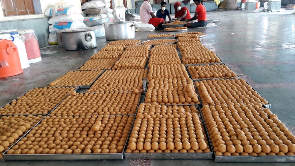 Workers preparing laddoos for Prasadam ahead of the foundation of Ram temple Workers preparing laddoos for Prasadam ahead of the foundation of Ram temple
