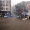 Vehicles submerged in the water following the heavy rainfall, in Mumbai.