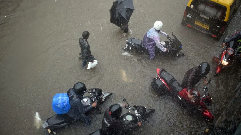 Mumbai rain Vehicles submerged in the water following the heavy rainfall, at Byculla in Mumbai on Wednesday.