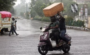 Cloud cover, patchy rains to keep mercury in check in Delhi: Met Dept Rain, New Delhi