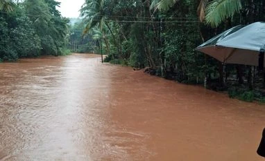 Flood A view of the flooded area due to incessant rainfall, at Gindabada in Honnavara on Monday.