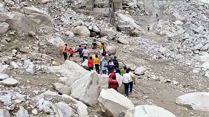 landslide. Pithoragarh Visitors walking as road blocked due to landslide following the heavy rainfall at Dharchula, in Pithoragarh on Thursday.