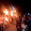 People raise slogans "Neelum-Jhelum behne do, humein zinda rehne do" and hold torch rally during a protest to oppose the mega dams to be constructed by Chinese firms on Neelum-Jhelum River, in Muzaffarabad city of Pakistan occupied Kashmir.