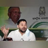 Tejashwi Yadav, RJD, Rashtriya Janta Dal Rashtriya Janta Dal leader Tejashwi Yadav addresses a press conference in Patna.