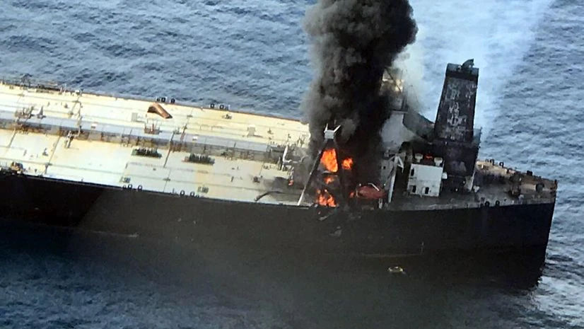 Sri Lanka, oil tanker, fire Smoke and Flame coming out of oil tanker container 'MT New Diamond' as ICG ships Shaurya, Sarang, Samudra Paheredar & Dornier aircraft engaged in fire fighting on oil tanker 37 nautical miles east off Sri Lanka coast on Thursday.