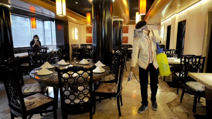 restaurants, coronavirus Cleaning and sanitization are going on at China Gate Restaurant in Bandra ahead of its reopening on October 5th as per Unlock 5.0 of Mission Begin Again guidelines of the Maharashtra Government, in Mumba