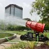 An Indian made anti-smog gun, a device that sprays water into the air to reduce pollution, is placed at a roundabout to curb pollution levels, in New Delhi on Monday.