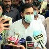 RJD leader Tej Pratap Yadav and Tejashwi Yadav speak to media