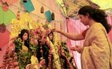 A Bengali woman offers a prayer to the idol of Goddess Durga as she participates in 'sindoor khela' on the occasion of Vijayadashami at a puja pandal in Lucknow on Monday. A Bengali woman offers a prayer to the idol of Goddess Durga as she participates in 'sindoor khela' on the occasion of Vijayadashami at a puja pandal in Lucknow on Monday.