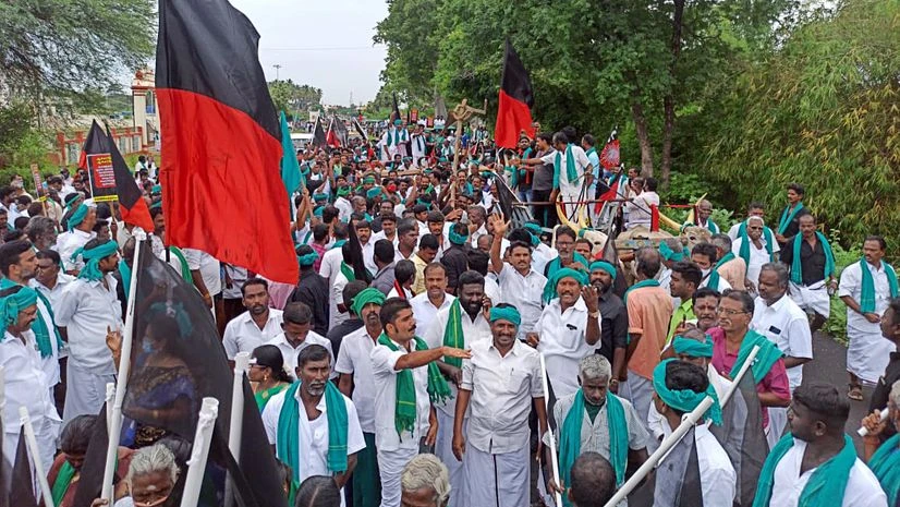 Farmers protest, farmers protest in delhi, farmers from punjab DMK supporters raise slogans during a protest against farm law, in Coimbatore on Saturday.
