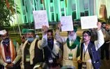 Farmer protest Farmers' leaders hold placards as they coming out after having a meeting with Union Agriculture Minister Narendra Singh Tomar, and Union Minister of Industry and Commerce Piyush Goyal at Vigyan Bhavan in New Delhi on Saturday.