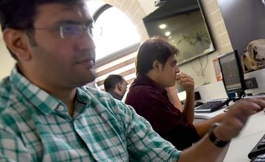 Sensex dips 132 pts as RBI cuts FY22 GDP growth; Nifty ends below 15,700 MARKET LIVE: Sensex falls 150 pts, tests 52k; Indiabulls Housing surges 15%