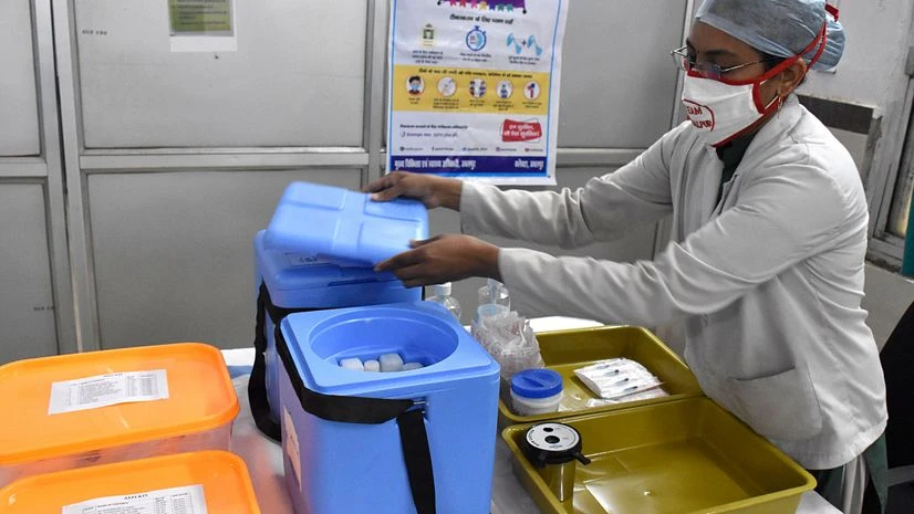 Covid-19 vaccine A medic worker arranges ice bags during a dry run for the COVID-19 vaccination, at Victoria hospital in Jabalpur on Friday.