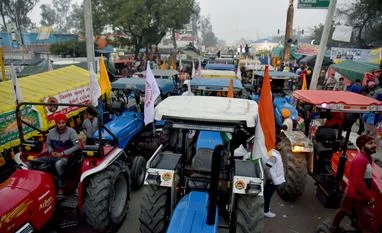 Modi's farm reform reversal to deter investment in India's agriculture Tractors are seen at the Singhu Border during a farmers protest against Farm law , in New Delhi