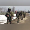 Security personnel patrolling as security tightens during a Preparations  for upcoming Republic Day celebrations at Handwara, in Kupwara district