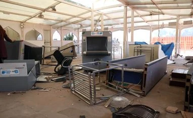 Delhi Police conducts raids in Jalandhar over vandalism at Red Fort Vandalised Security check machines seen after farmers' tractor rally, at Red Fort in New Delhi