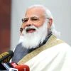 Prime Minister Narendra Modi addresses media as he arrives to attend the Budget Session of Parliament, in New Delhi on Friday.