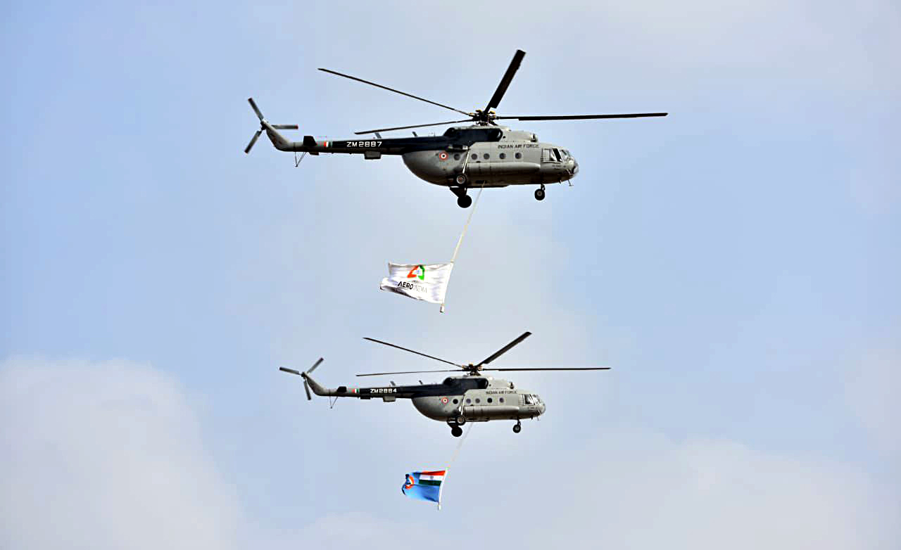 Indian Air Force helicopters at the inaugural ceremony of the Aero India show Indian Air Force helicopters at the inaugural ceremony of the Aero India show
