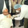 Bihar Chief Minister Nitish Kumar receives the first dose of COVID19 vaccine, in Patna on Monday.