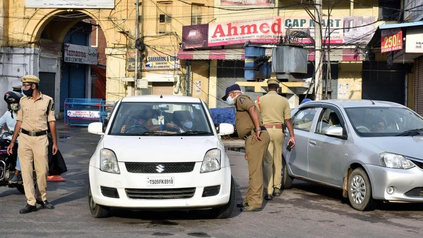 Police checking the vehicles during lockdown to curb the Covid19 cases at Madina Circle in Hyderabad on Thursday. Police checking the vehicles during lockdown to curb the Covid19 cases at Madina Circle in Hyderabad on Thursday.