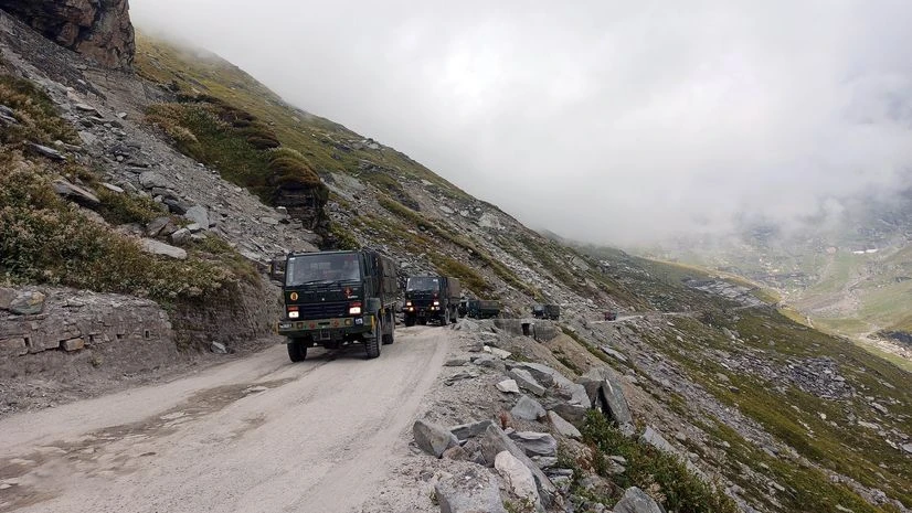Army vehicles carrying military material for soldiers deployed along the border from Rohtang Pass on Manali-Leh Highway. (Photo: ANI) Army vehicles carrying military material for soldiers deployed along the border from Rohtang Pass on Manali-Leh Highway. (Photo: ANI)