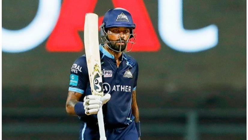 Hardik Pandya Mumbai: Hardik Pandya of Gujarat Titans raises his bat scoring fifty runs during T20 cricket match 67 of the Indian Premier League 2022 (IPL season 15), between the Royal Challengers Bangalore and Gujarat Titans, at the Wankhede Stadium in Mumbai, Th