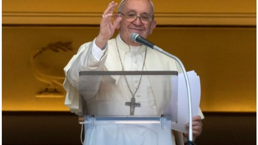 Pope Francis Pope Francis delivers his blessing as he recites the Regina Coeli noon prayer from the window of his studio overlooking St.Peter's Square, at the Vatican, Sunday, May 22, 2022. AP/PTI