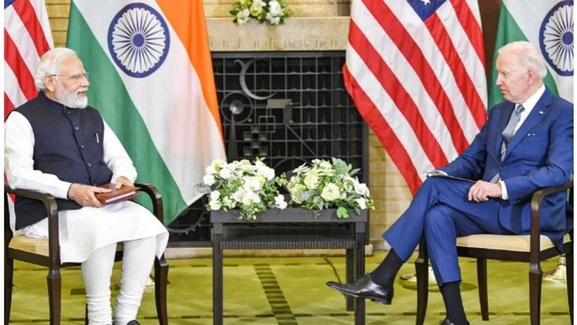 Narendra Modi (L) Joe Biden (R) Tokyo: Prime Minister Narendra Modi and US President Joe Biden hold talks on the sidelines of Quad Summit meeting, in Tokyo, Tuesday, May 24, 2022. (PTI Photo