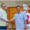 Vinai Kumar Saxena(L), Arvind Kejriwal (R)