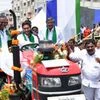 Guntur: Andhra Pradesh Chief Minister YS Jaganmohan Reddy flagged a mega programme providing tractors and combined harvesters as part of the YSR Yantra Seva scheme to farmers of the state, in Guntur district, Tuesday, June 7, 2022. (PTI Photo)(