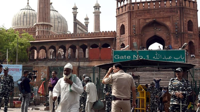 Paramilitary and police personnel stand guard during a protest over alleged remarks by suspended BJP leader Nupur Sharma and expelled leader Naveen Jindal, at Jama Masjid, in New Delhi on Friday. Paramilitary and police personnel stand guard during a protest over alleged remarks by suspended BJP leader Nupur Sharma and expelled leader Naveen Jindal, at Jama Masjid, in New Delhi on Friday.