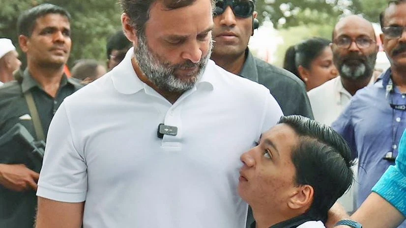 Congress leader Rahul Gandhi meets a 15-year-old specially-abled Mohammad Asim, who swam across the Periyar river in an hour without arms, during party's Bharat Jodo Yatra, in Wayanad on Wednesday. Congress leader Rahul Gandhi meets a 15-year-old specially-abled Mohammad Asim, who swam across the Periyar river in an hour without arms, during party's Bharat Jodo Yatra, in Wayanad on Wednesday.