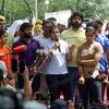 Wrestler Sakshi Malik addresses the media ahead of the protest march from Jantar Mantar to New Parliament House against the alleged sexual harassment of women wrestlers by WFI chief Brij Bhushan Sharan Singh, in New Delhi on Sunday. Wrestlers Vinesh