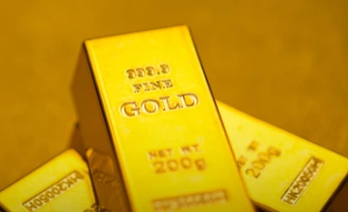 Gold prices to trade with bullish bias till trade war recedes: Analyst Gold bars
